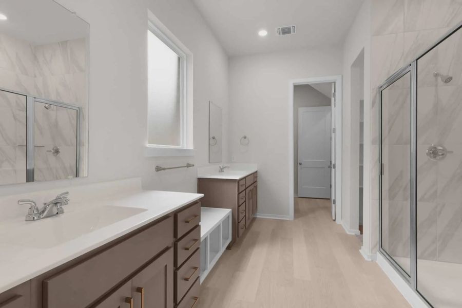 Representative furnished interior of a home built from the Madison by Chesmar Homes in University Heights, McKinney (Image 8).