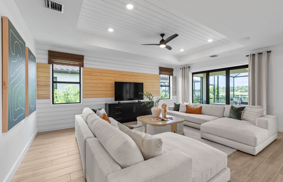 Connected living space with bright windows, perfect feature in a new construction home