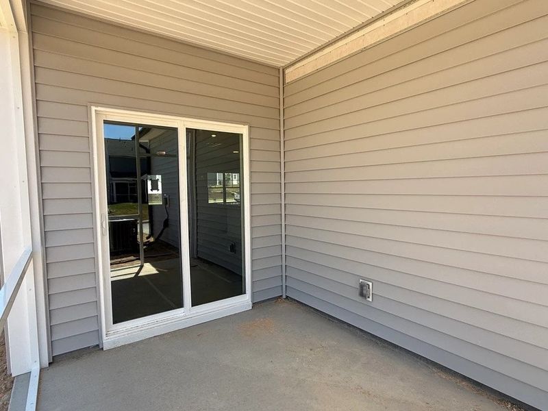 Exterior details and patio area of a home in The Point, Rolesville (Image 3).