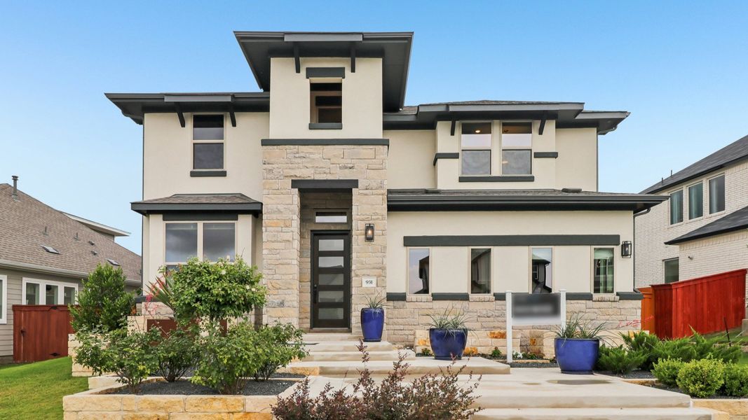 Representative exterior photo of a completed home built from the Rosewood by DRB Homes in Briarwood, Elgin, TX (Image 24).