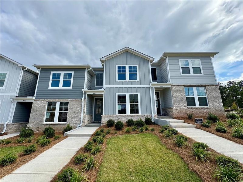 Front exterior of a new home in Stegall Village, Emerson, GA, highlighting curb appeal (Image 76).