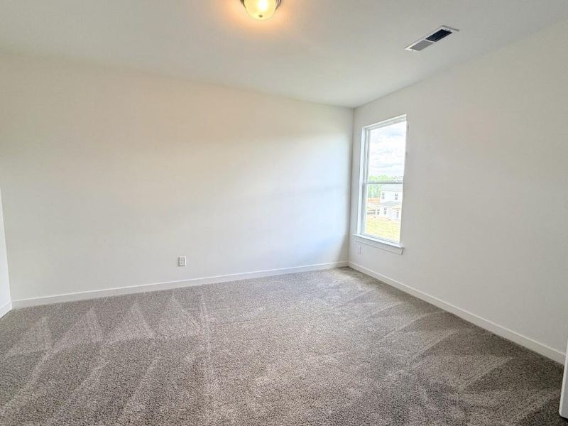 Spacious, unfurnished interior of a new home in Sutton's Landing, Statham (Image 18).