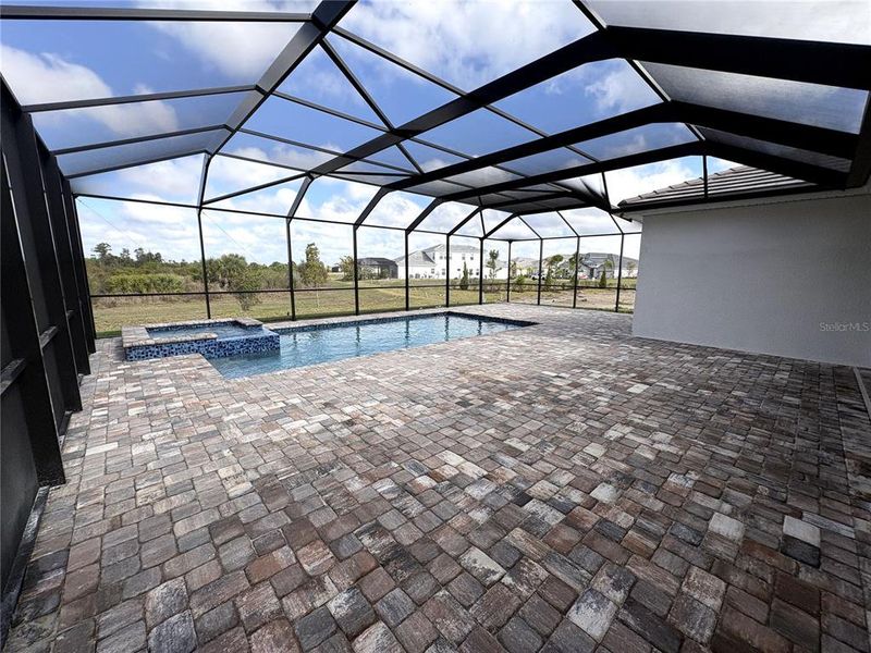 Exterior details and patio area of a home in EVERLY at Wellen Park, Venice (Image 22).