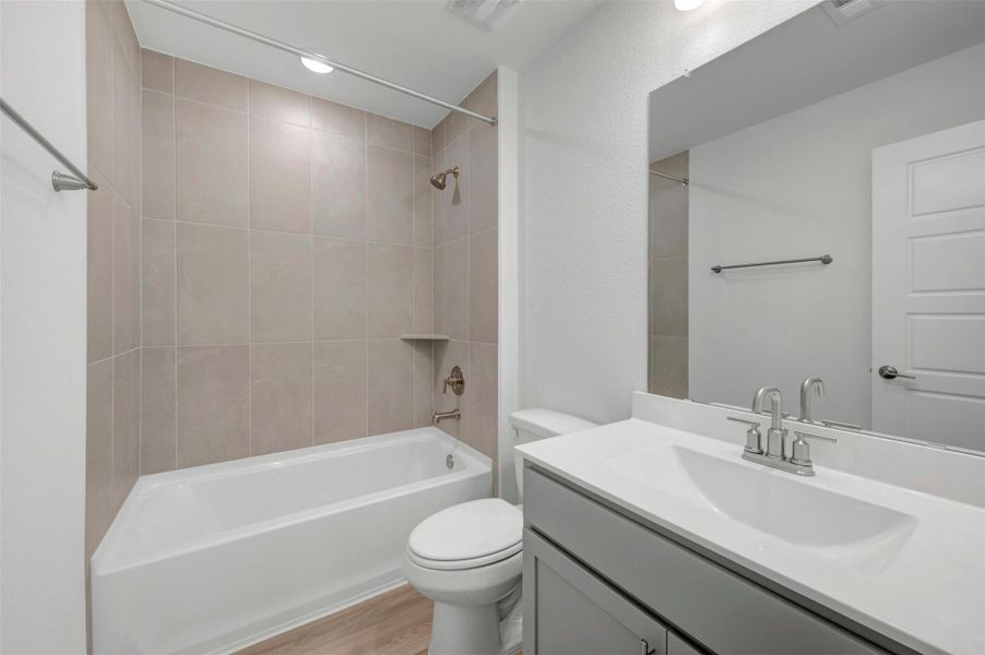 Furnished interior view inside a new home in Lone Star Landing, Montgomery (Image 12).