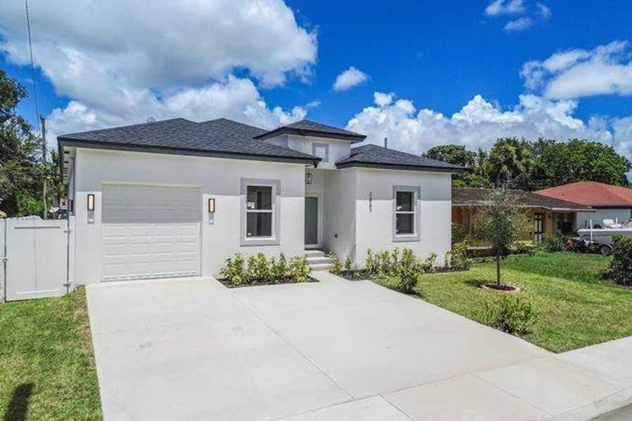 Front exterior of a new home in , Fort Lauderdale, FL, highlighting curb appeal (Image 20). Front exterior of a new home in , Fort Lauderdale, FL, highlighting curb appeal (Image 20).