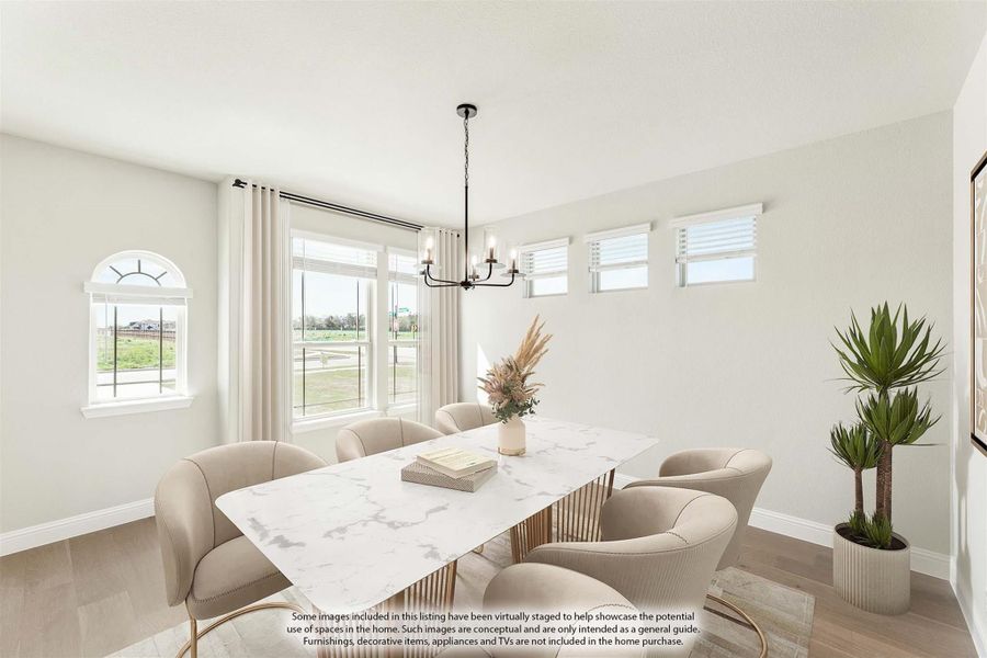 Dining room with marble-top table, six beige chairs, black chandelier, and large windows with natural light Dining room with marble-top table, six beige chairs, black chandelier, and large windows with natural light