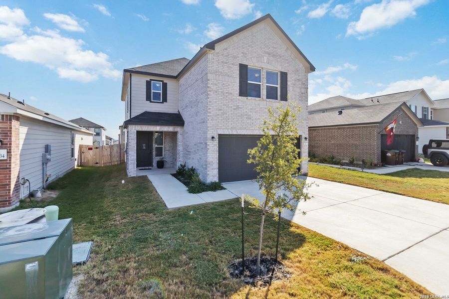 Front exterior of a new home in , San Antonio, TX, highlighting curb appeal (Image 2). Front exterior of a new home in , San Antonio, TX, highlighting curb appeal (Image 2).
