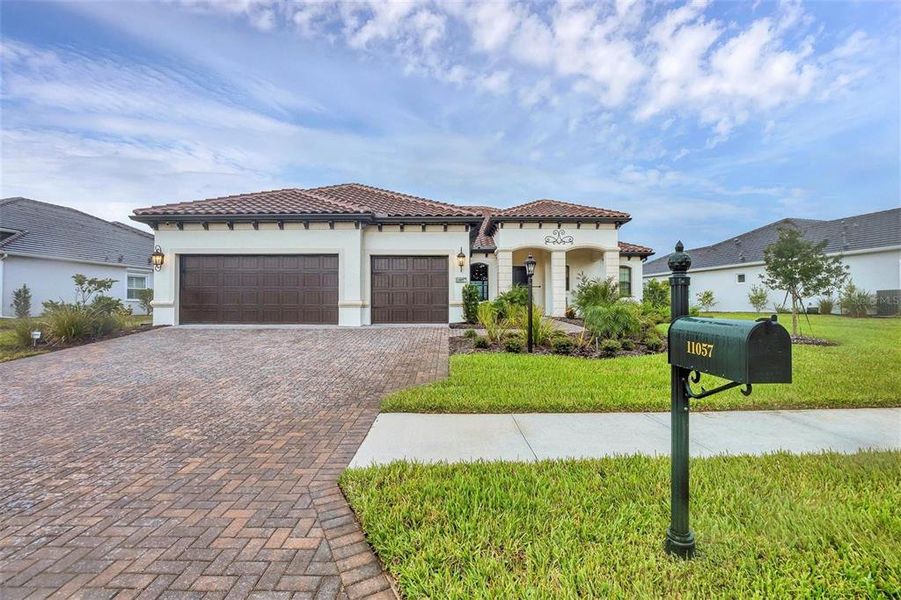 Front exterior of a new home in , Englewood, FL, highlighting curb appeal (Image 23).