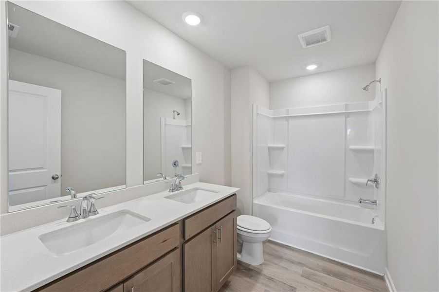 Furnished interior view inside a new home in Northwoods at Mirror Lake, Villa Rica (Image 16).