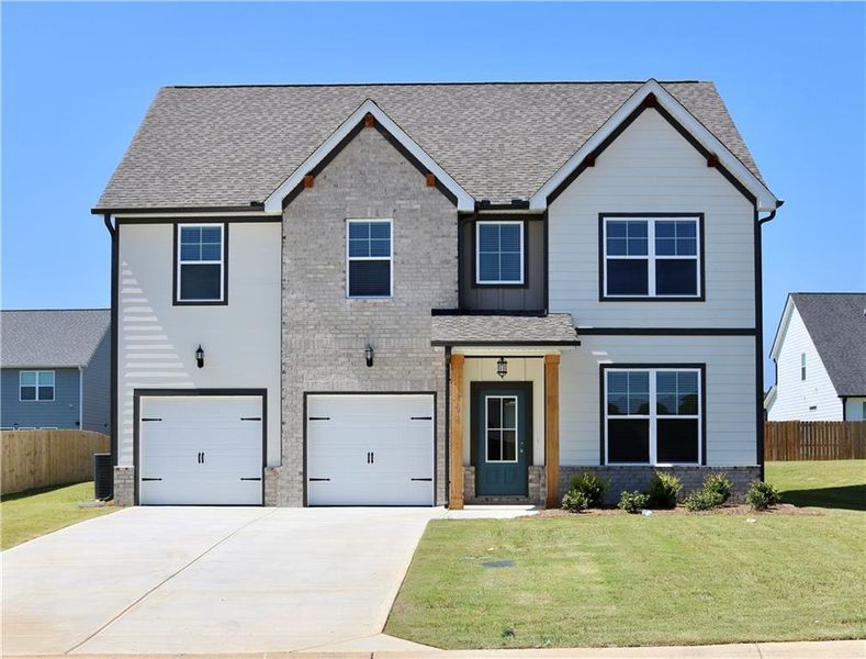 Front exterior of a new home in , Bonaire, GA, highlighting curb appeal (Image 2).