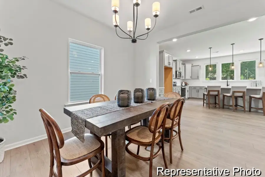Furnished interior view inside a new home in Whispering Hills, Locust (Image 5).