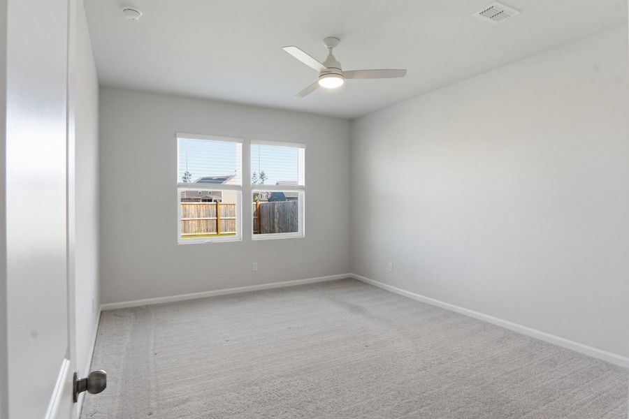 Spacious, unfurnished interior of a new home in Sanctuary Cove at Cane Bay, Summerville (Image 38).
