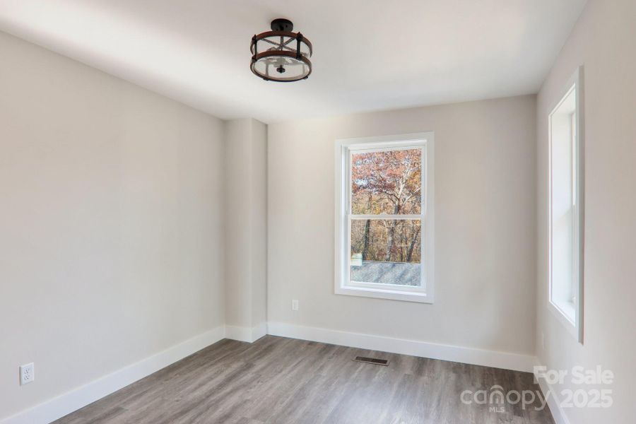 Spacious, unfurnished interior of a new home in , Asheville (Image 10).