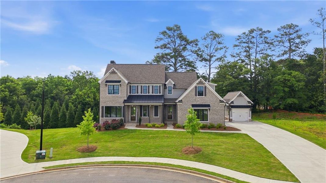 Front exterior of a new home in , Marietta, GA, highlighting curb appeal (Image 25).