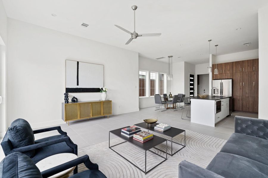 Abundant natural light flows through expansive windows, while LED lights illuminate the space at night. Abundant natural light flows through expansive windows, while LED lights illuminate the space at night.