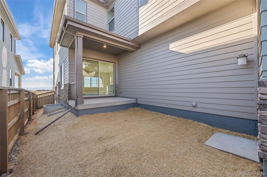 Exterior details and patio area of a home in Painted Prairie, Aurora (Image 2). Exterior details and patio area of a home in Painted Prairie, Aurora (Image 2).