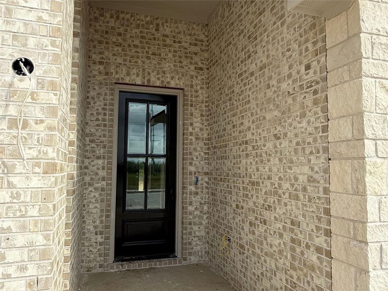 Exterior details and patio area of a home in , College Station (Image 3).