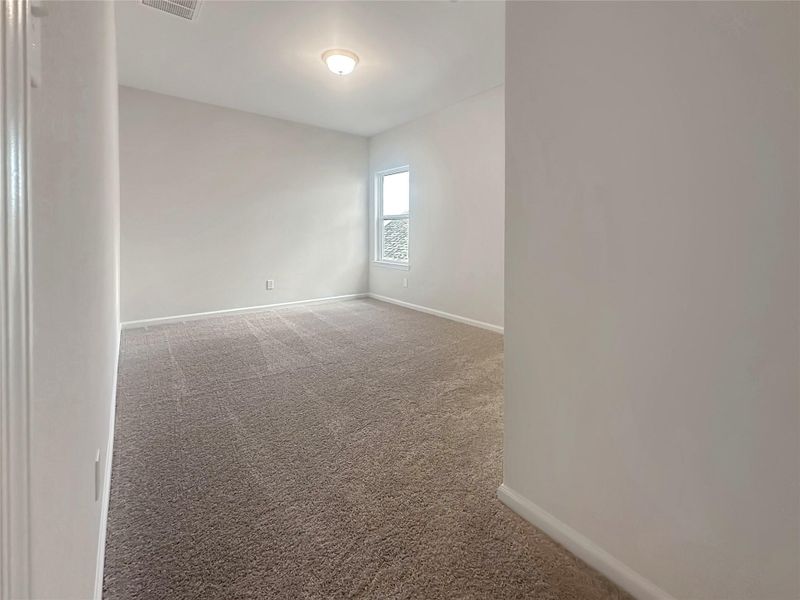 The Caldwell- Primary Bedroom. Home is under construction. Sample image for illustration; upgrades, options, and colors may vary.