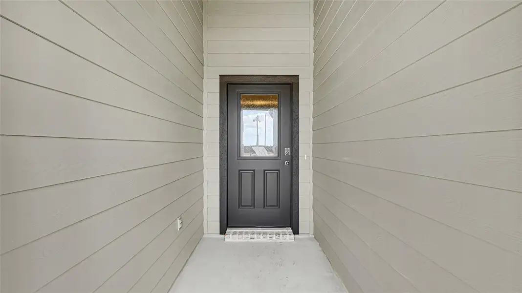 Exterior details and patio area of a home in August Trails, Needville (Image 27). Exterior details and patio area of a home in August Trails, Needville (Image 27).