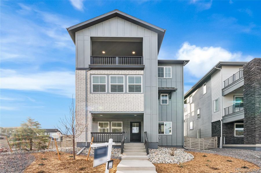 Exterior details and patio area of a home in Sterling Ranch Apex Collection, Littleton (Image 4).