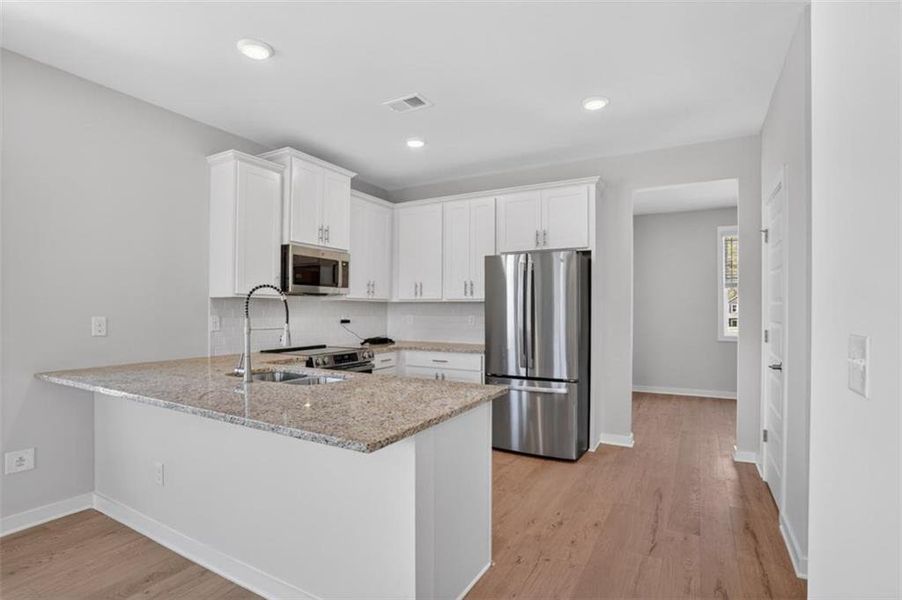 Furnished interior view inside a new home in , Fayetteville (Image 7).