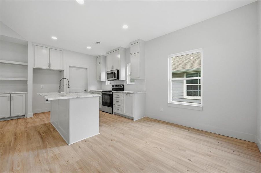Furnished interior view inside a new home in , Denison (Image 5). Furnished interior view inside a new home in , Denison (Image 5).