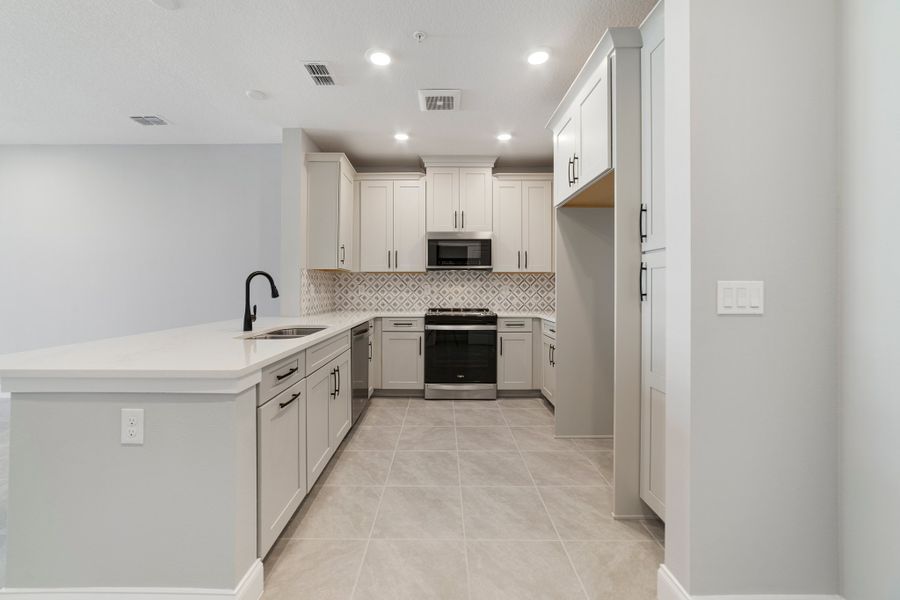 Furnished interior view inside a new home in Gatherings® of Lake Nona, Orlando (Image 7).