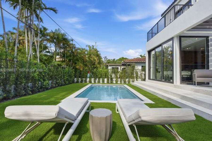 Exterior details and patio area of a home in , Coral Gables (Image 26).