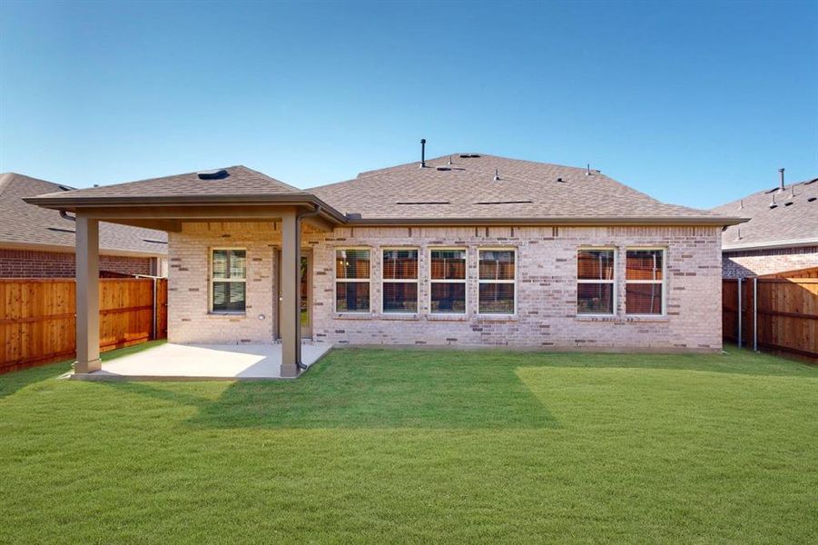 Front exterior of a new home in Mobberly Farms, Pilot Point, TX, highlighting curb appeal (Image 2).