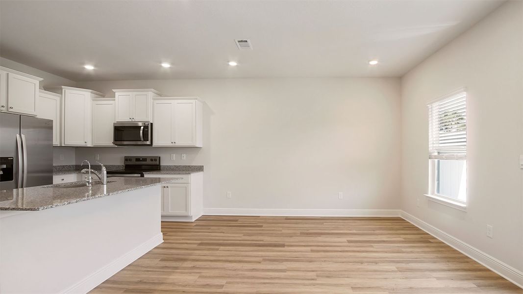 Representative unfurnished interior of a home built from the Palm Interior by D.R. Horton in Caballeros Estates Townhomes at Hombre, Panama City Beach (Image 22). Representative unfurnished interior of a home built from the Palm Interior by D.R. Horton in Caballeros Estates Townhomes at Hombre, Panama City Beach (Image 22).