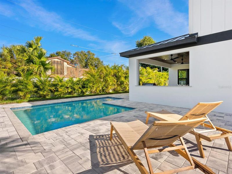 Exterior details and patio area of a home in , Sarasota (Image 35).