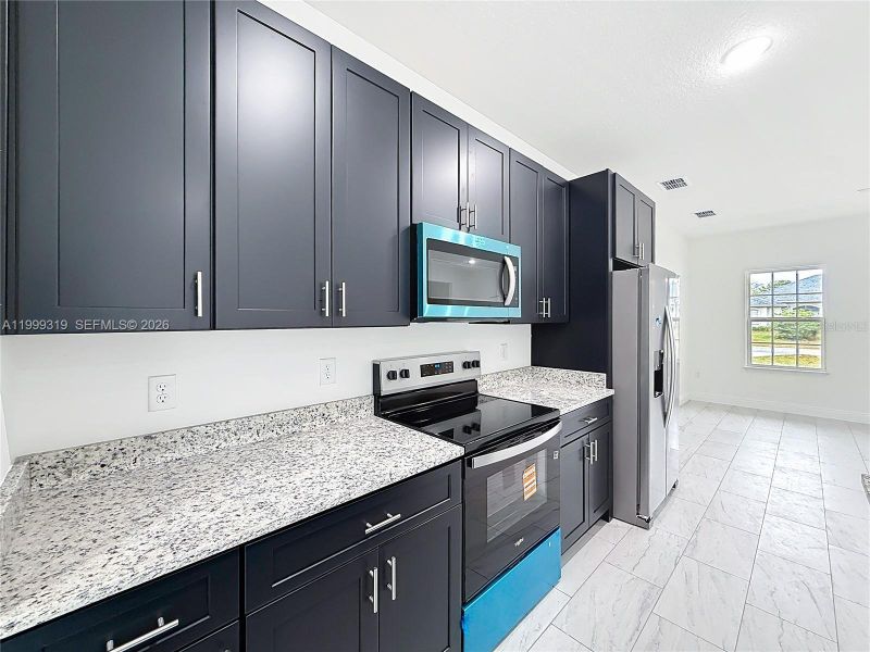 Furnished interior view inside a new home in , Ocala (Image 4).