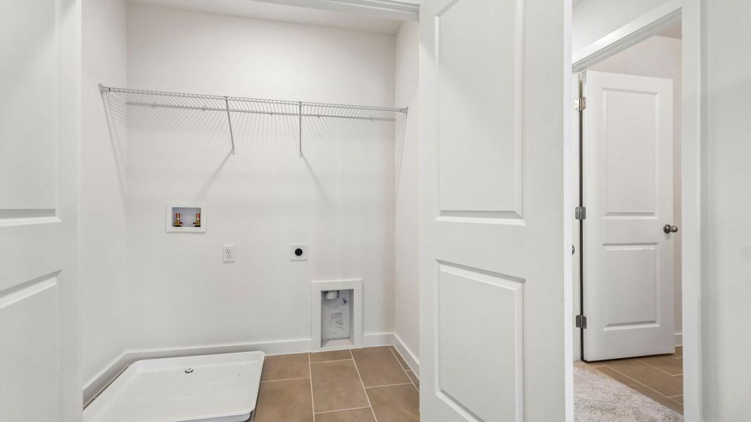 Furnished interior view inside a new home in Cyrene at Harmony, St. Cloud (Image 28).