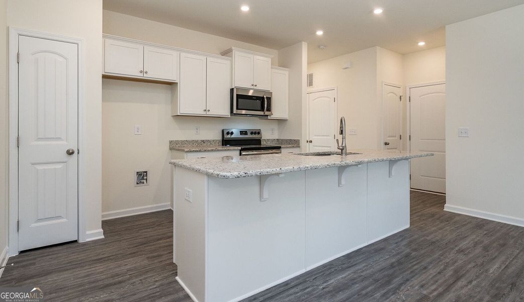 Furnished interior view inside a new home in The Cottages of Silvertown, Thomaston (Image 3).
