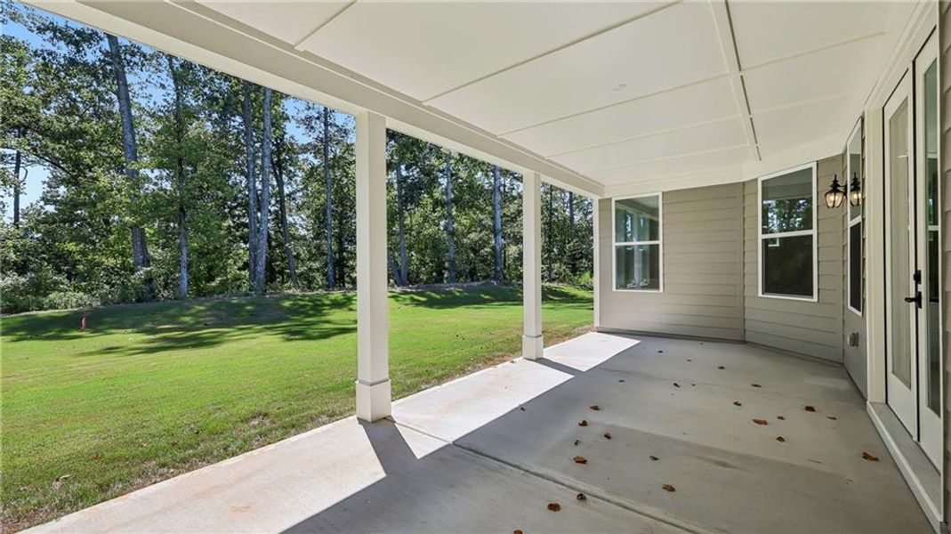Exterior details and patio area of a home in Cresswind Georgia at Twin Lakes, Hoschton (Image 27).