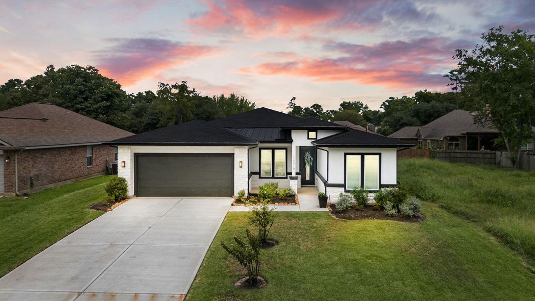 Front exterior of a new home in , Montgomery, TX, highlighting curb appeal (Image 22). Front exterior of a new home in , Montgomery, TX, highlighting curb appeal (Image 22).