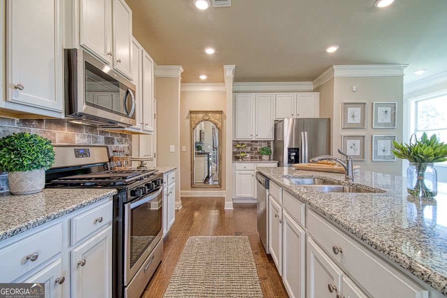 Furnished interior view inside a new home in Millstone at Mundy Mill, Gainesville (Image 7). Furnished interior view inside a new home in Millstone at Mundy Mill, Gainesville (Image 7).