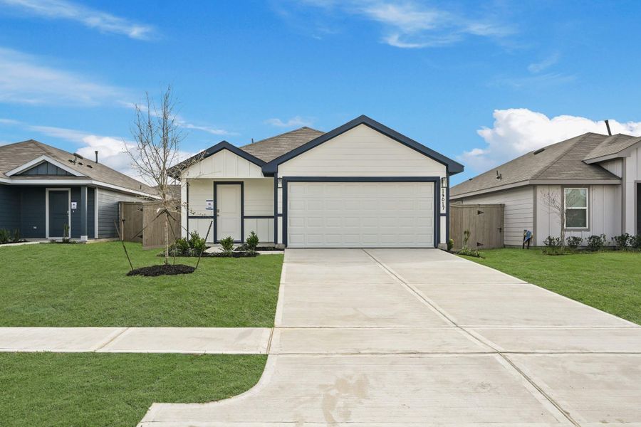 Front exterior of a new home in Presswoods, Splendora, TX, highlighting curb appeal (Image 5).