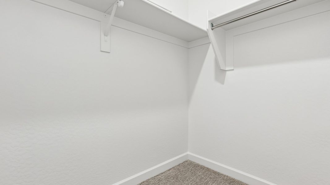 Representative unfurnished interior of a home built from the Phoenician by D.R. Horton in The Ridge at Stone Butte, Phoenix (Image 45). Representative unfurnished interior of a home built from the Phoenician by D.R. Horton in The Ridge at Stone Butte, Phoenix (Image 45).