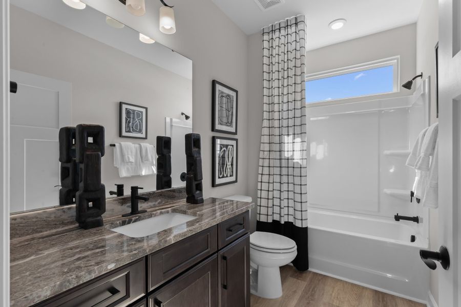 Representative furnished interior of a home built from the The Sand Dollar by Chesapeake Homes in Coastal Club of the Carolinas, Calabash (Image 26).