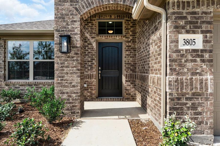 Exterior details and patio area of a home in Fox Landing, Caddo Mills (Image 3).
