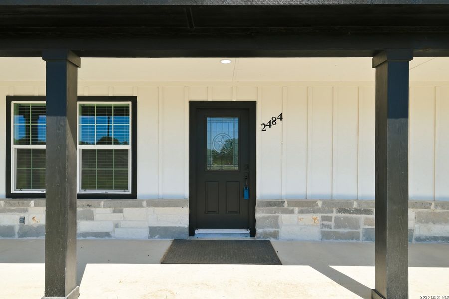 Exterior details and patio area of a home in , Floresville (Image 14).