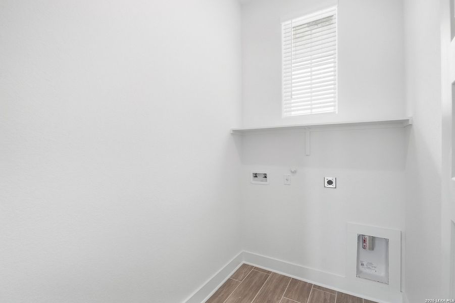 Spacious, unfurnished interior of a new home in The Reserve at Potranco Oaks, Castroville (Image 26). Spacious, unfurnished interior of a new home in The Reserve at Potranco Oaks, Castroville (Image 26).
