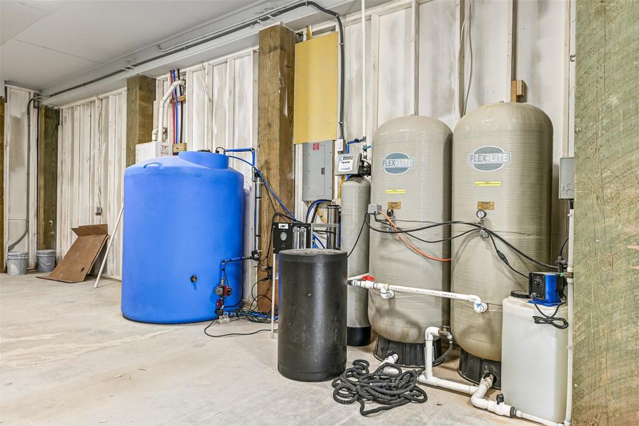 A reverse osmosis system paired with a 450 gallon holding tank provides clean, reliable water and added peace of mind. Thoughtful infrastructure supports the home’s elevated off grid lifestyle.