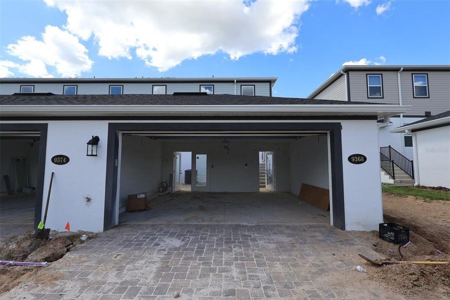 In-progress construction of a new home in Tribute at Ovation, Winter Garden, FL (Image 44).