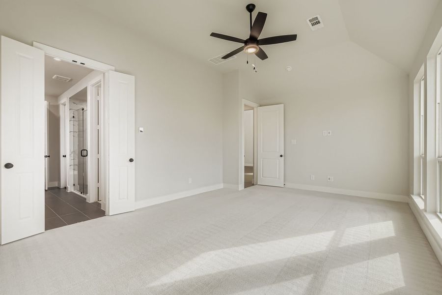 Light-Filled Primary Bedroom| Plan 1581 | Representative Photo