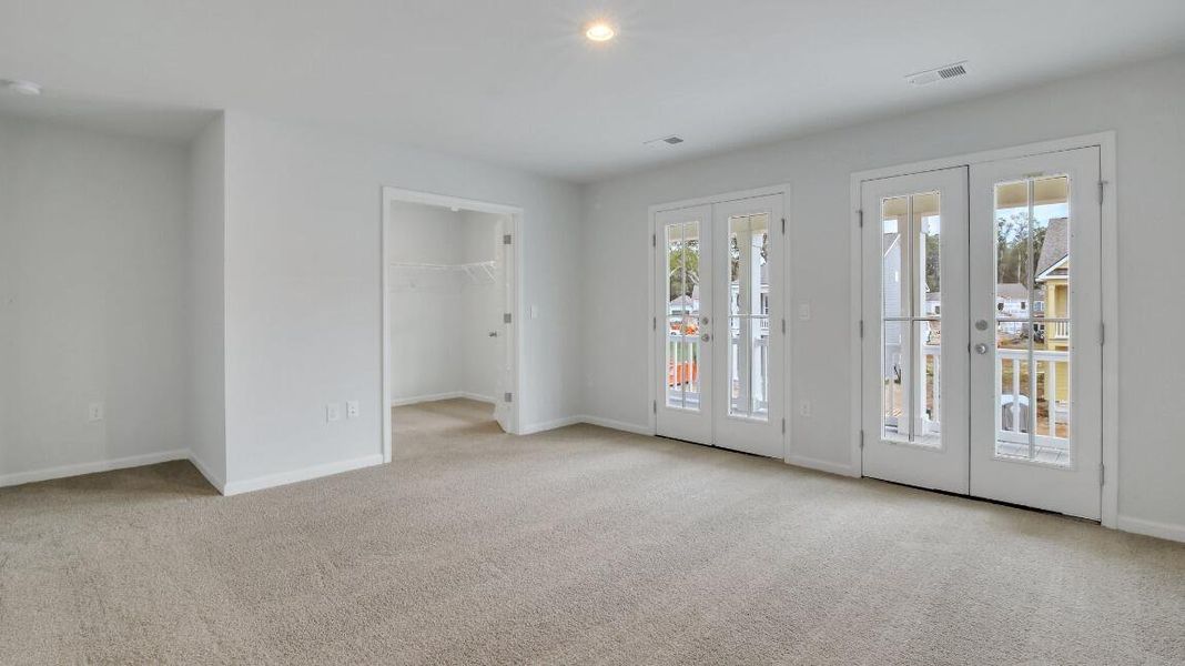 Spacious, unfurnished interior of a new home in Rivers Reach, Yemassee (Image 9).