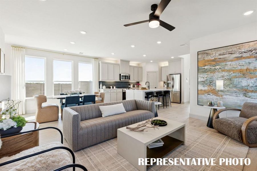 You'll find a family room large enough to host the entire family in our Bella II plan.  REPRESENTATIVE PHOTO