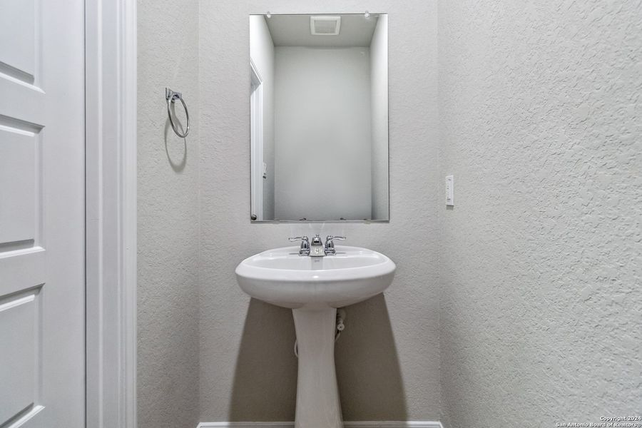 Close-up of interior finishes inside a home in Abbott Run, San Antonio (Image 14).