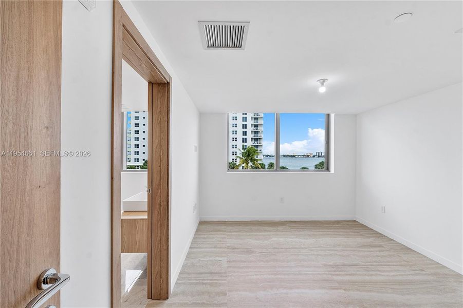 Spacious, unfurnished interior of a new home in , Bay Harbor Islands (Image 14). Spacious, unfurnished interior of a new home in , Bay Harbor Islands (Image 14).
